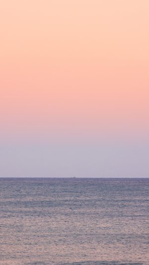 無料スマホ壁紙 優しい夕焼けの海。AndroidとiPhoneに対応した4K高画質の無料待ち受け画像。三重県御浜町の七里御浜ふれあいビーチで撮影したフリー写真素材