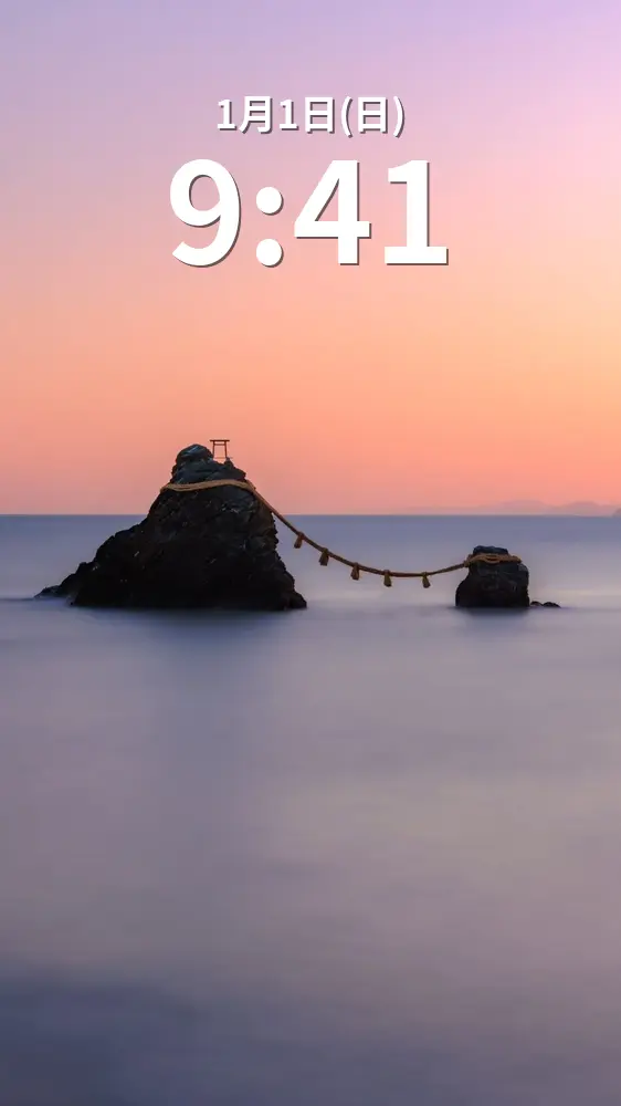 無料スマホ壁紙 朝焼けの夫婦岩。AndroidとiPhoneに対応した4K高画質の無料待ち受け画像。三重県伊勢市の夫婦岩で撮影したフリー写真素材