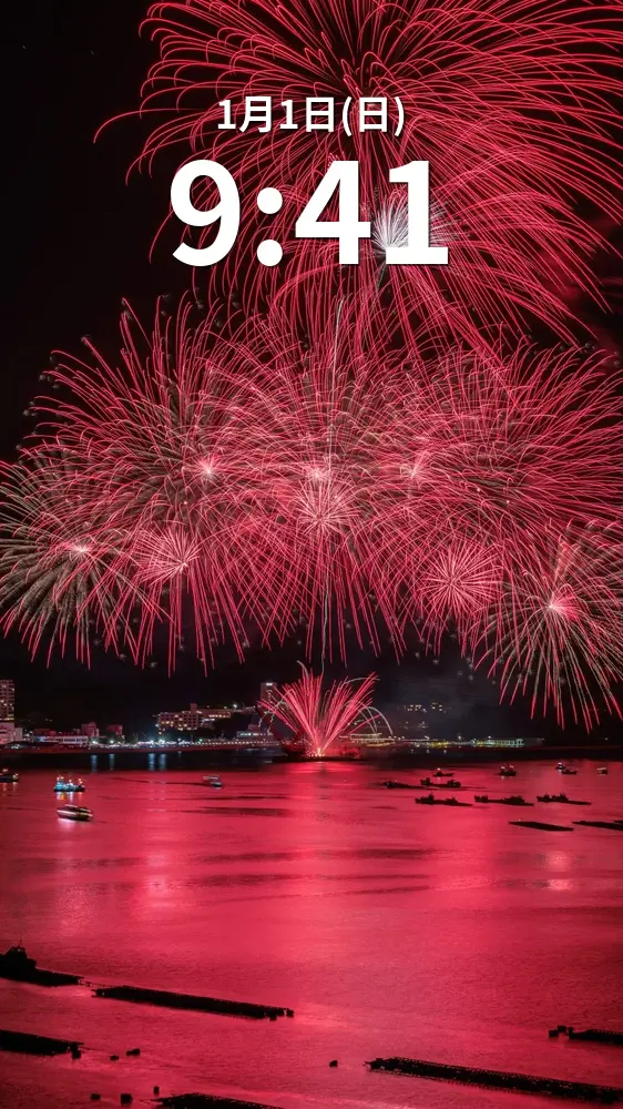 無料スマホ壁紙 真っ赤な連発花火。AndroidとiPhoneに対応した4K高画質の無料待ち受け画像。三重県鳥羽市の鳥羽みなとまつりで撮影したフリー写真素材