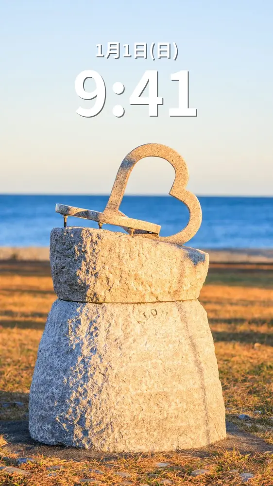 無料スマホ壁紙 ハートの先に広がるサンセットビーチ。AndroidとiPhoneに対応した4K高画質の無料待ち受け画像。三重県御浜町の七里御浜ふれあいビーチで撮影したフリー写真素材